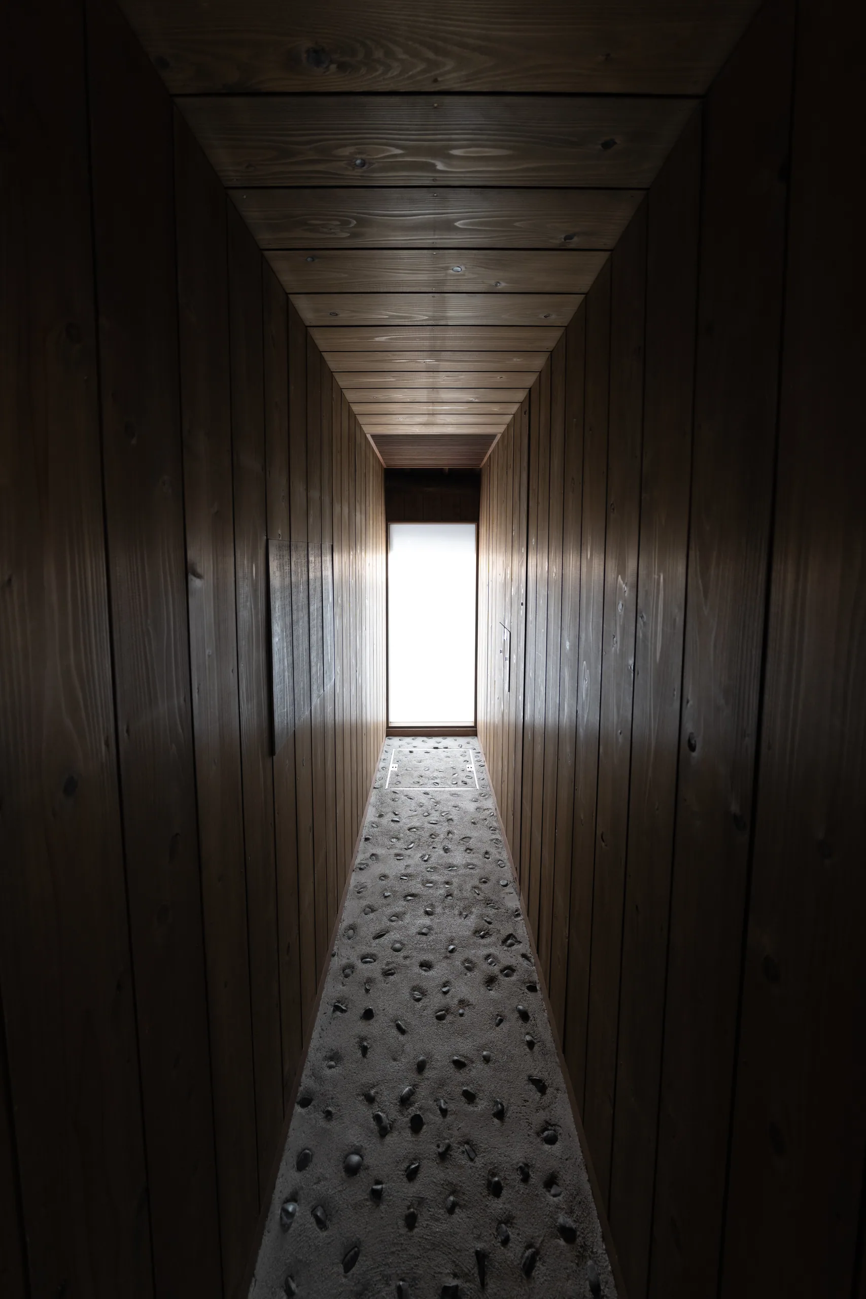Japan: A timber-lined corridor ending in light, Naoshima